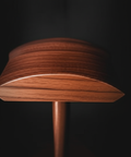 Close-up of Oakstead rosewood headphone stand wood grain detail